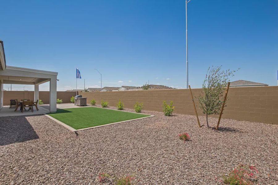 Representative exterior details of a home built from the 2326 by Elliott Homes in Acacia at Santana, Yuma (Image 29).