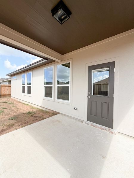 Exterior details and patio area of a home in TerraVista, Victoria (Image 4).