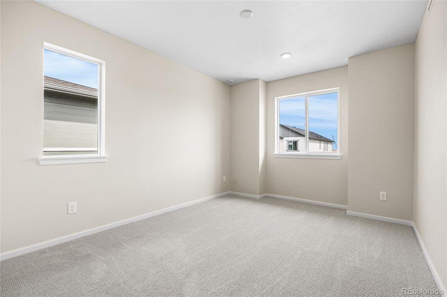 Spacious, unfurnished interior of a new home in Barefoot Village, Firestone (Image 27).