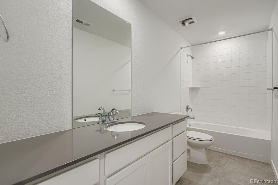 Furnished interior view inside a new home in Parterre, Thornton (Image 6).
