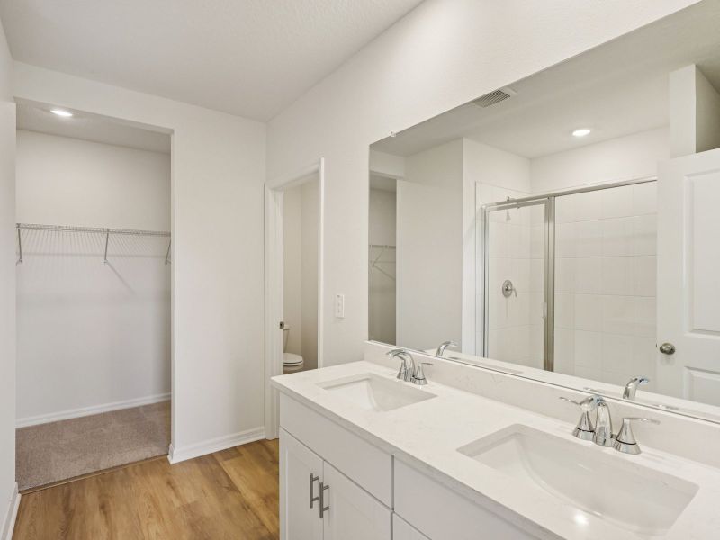 Furnished interior view inside a new home in The Grove at Stuart Crossing - Classic Series, Bartow (Image 10). Furnished interior view inside a new home in The Grove at Stuart Crossing - Classic Series, Bartow (Image 10).