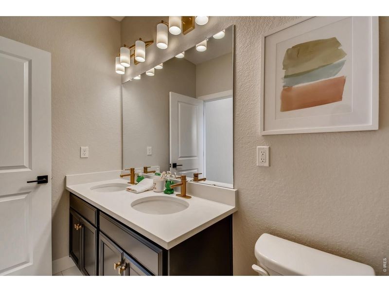 Furnished interior view inside a new home in Mountain Brook, Longmont (Image 13).