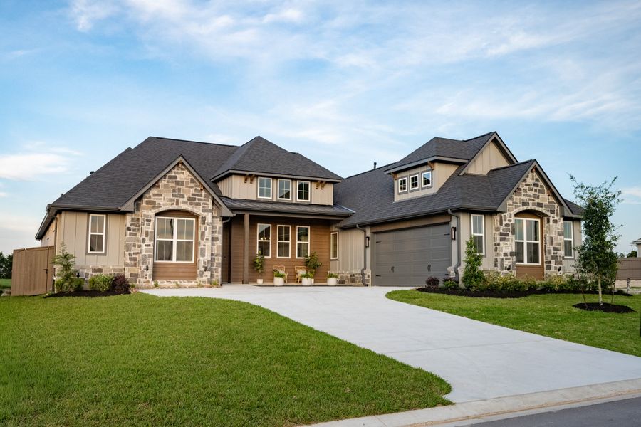 Front exterior of a new home in Stella Ranch, Bryan, TX, highlighting curb appeal (Image 28).