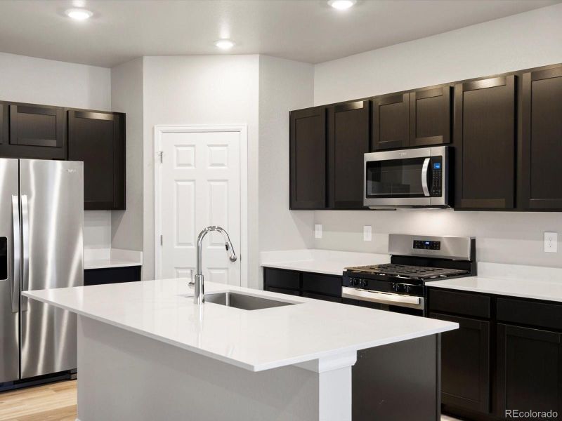 Furnished interior view inside a new home in Buffalo Highlands: The Flora Collection, Commerce City (Image 6). Furnished interior view inside a new home in Buffalo Highlands: The Flora Collection, Commerce City (Image 6).