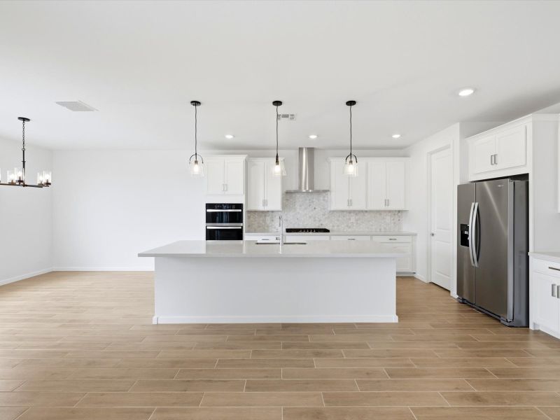 Furnished interior view inside a new home in White Tank Foothills Signature Series, Waddell (Image 4).