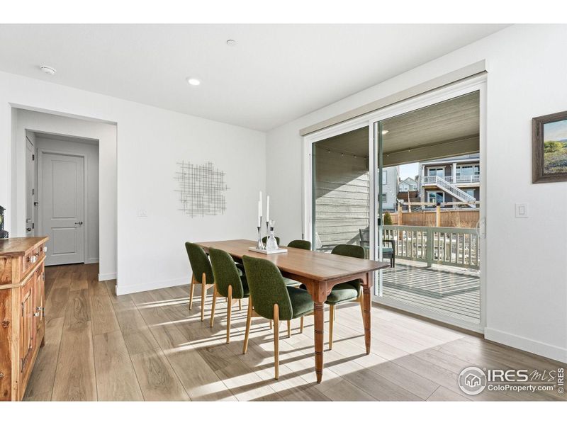 Dining area with direct access to the backyard - perfect for indoor-outdoor living.