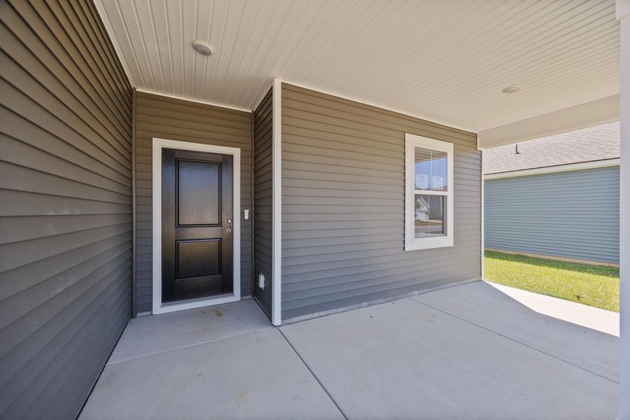 Exterior details and patio area of a home in Bradford Pointe, Summerville (Image 2).