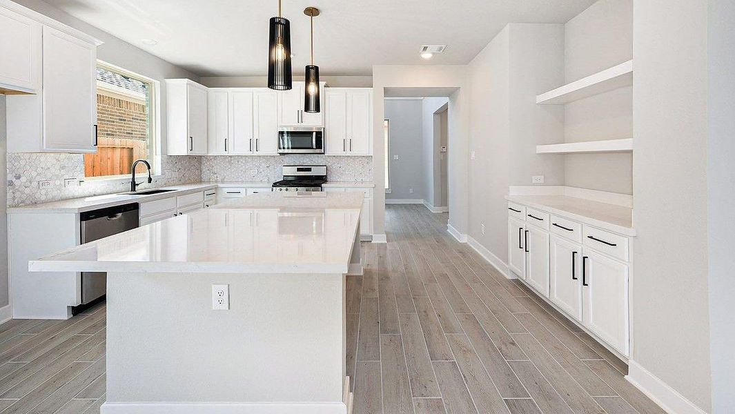 Furnished interior view inside a new home in Grand Central Park, Conroe (Image 3).