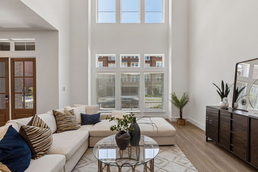 Representative furnished interior of a home built from the Roosevelt by Centre Living Homes in Newman Village Townhomes, Frisco (Image 5).