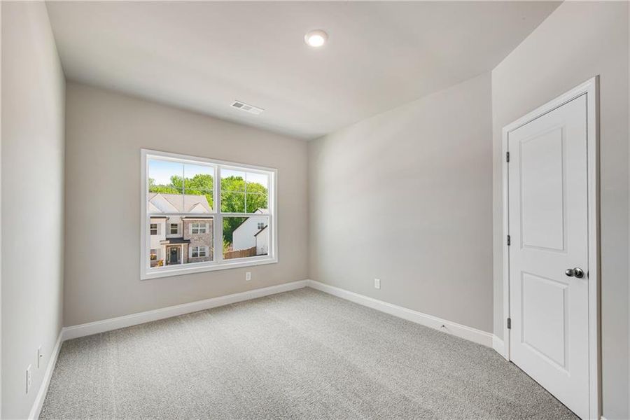Spacious, unfurnished interior of a new home in Hidden Fields, Hoschton (Image 46).
