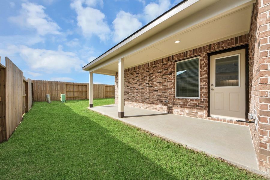 Experience outdoor living at its finest on this expansive covered patio, thoughtfully designed for BBQs and delightful outdoor dining. Experience outdoor living at its finest on this expansive covered patio, thoughtfully designed for BBQs and delightful outdoor dining.