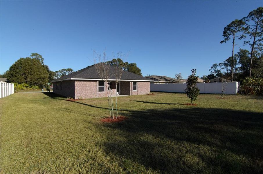 Exterior details and patio area of a home in Palm Coast, Palm Coast (Image 16).