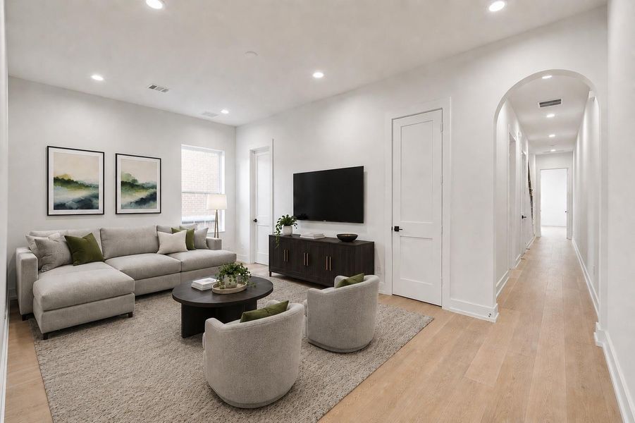 Spacious game room has a closet and full bathroom.