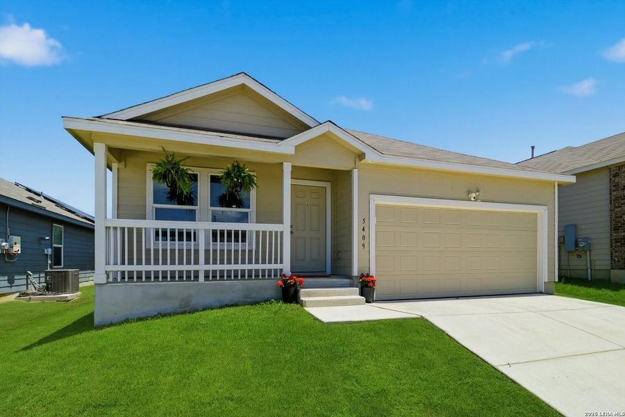 Front exterior of a new home in Sage Meadows, St. Hedwig, TX, highlighting curb appeal (Image 20). Front exterior of a new home in Sage Meadows, St. Hedwig, TX, highlighting curb appeal (Image 20).