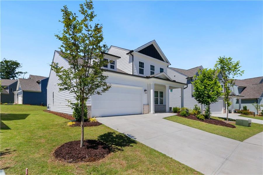Front exterior of a new home in Edgewater, Canton, GA, highlighting curb appeal (Image 15).