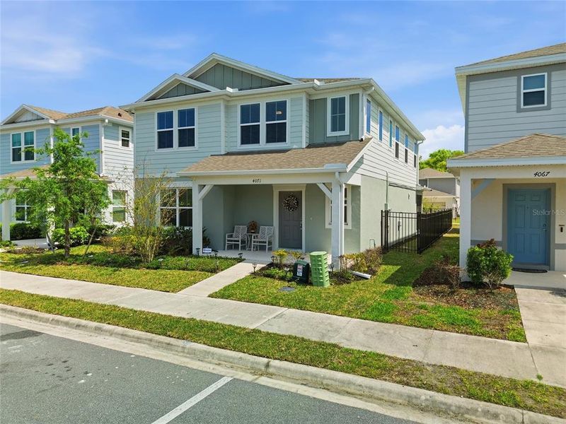 Front exterior of a new home in Winding Meadows, Apopka, FL, highlighting curb appeal (Image 27).