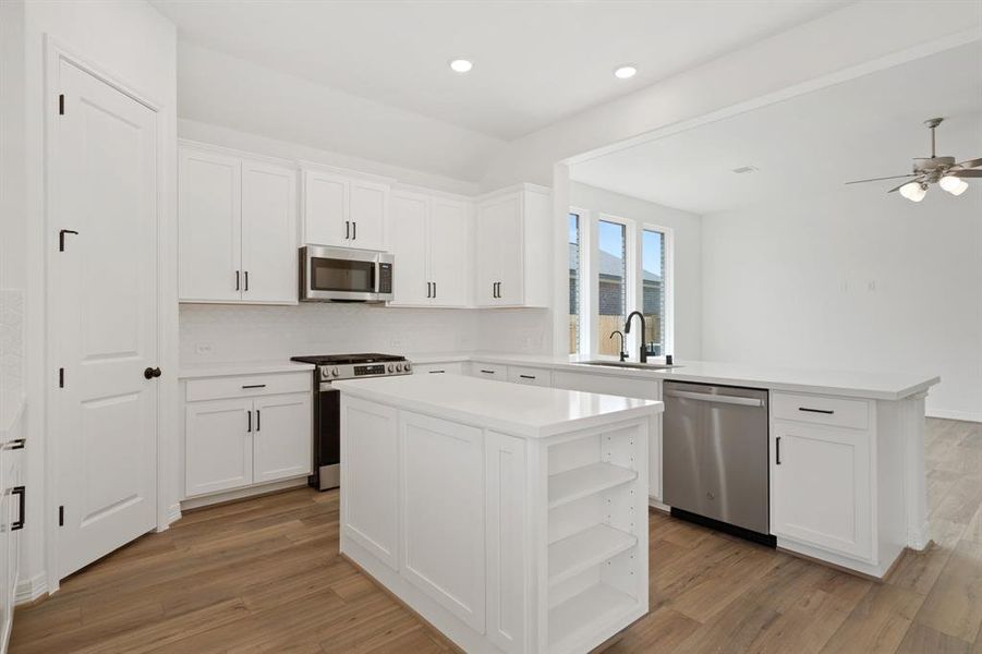 This kitchen is not only a functional space but also has ample storage. Whether you're a seasoned chef or just love to gather and enjoy good food, this kitchen is a dream come true.