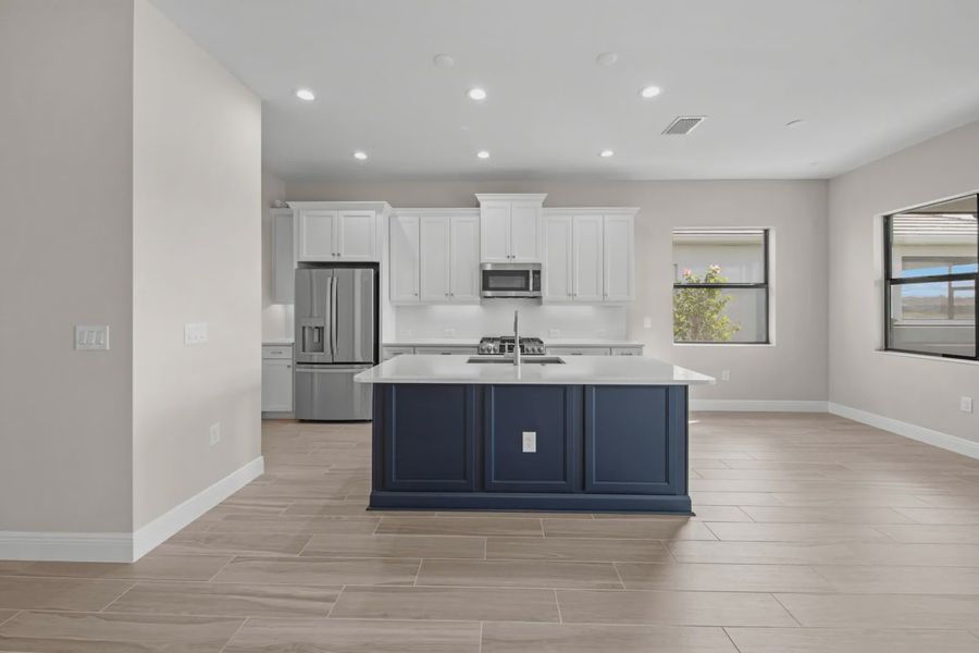 Representative furnished interior of a home built from the Eventide 4 by Neal Communities in SkySail, Naples (Image 8).