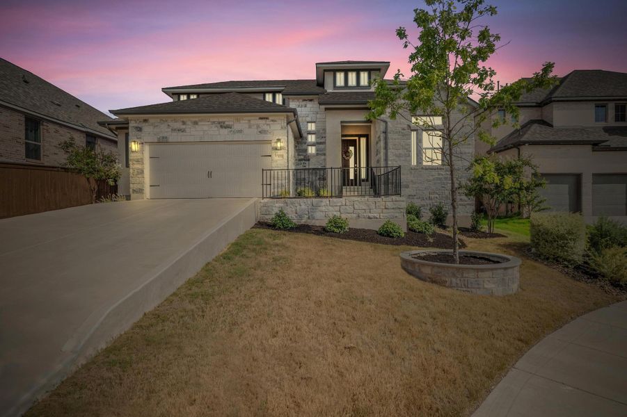 Front exterior of a new home in , Leander, TX, highlighting curb appeal (Image 18). Front exterior of a new home in , Leander, TX, highlighting curb appeal (Image 18).