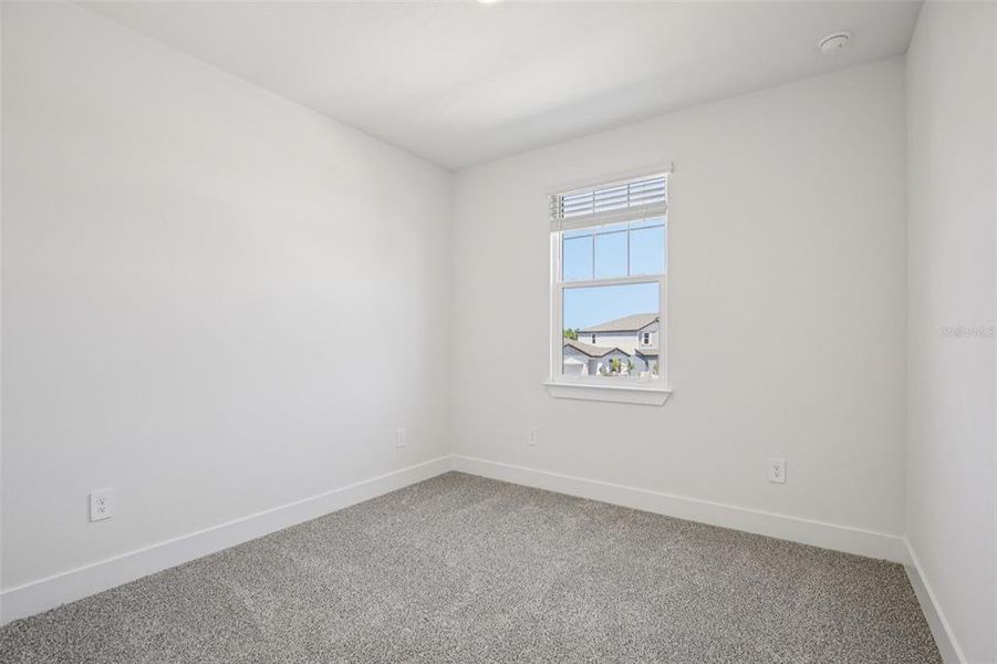 Spacious, unfurnished interior of a new home in Magnolia Bay - Reserve Series, Nokomis (Image 27).