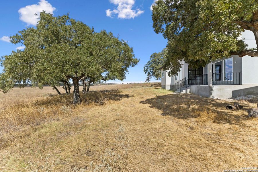Exterior details and patio area of a home in , La Vernia (Image 31).