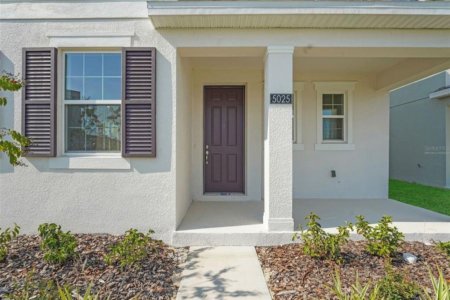 Exterior details and patio area of a home in Crossroads at Kelly Park, Apopka (Image 4). Exterior details and patio area of a home in Crossroads at Kelly Park, Apopka (Image 4).