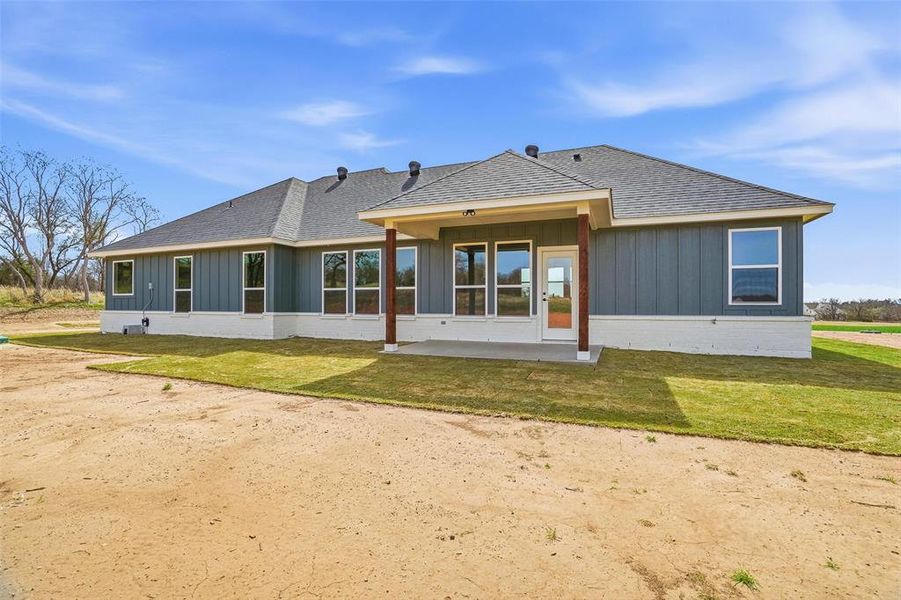 Exterior details and patio area of a home in Taylor Ranch, Springtown (Image 21).