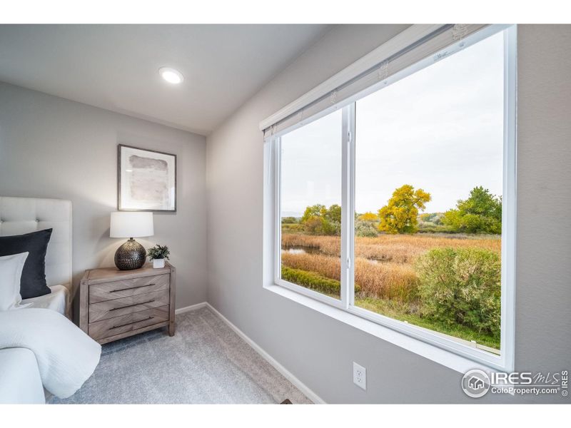 Furnished interior view inside a new home in Thompson River Ranch, Johnstown (Image 29).
