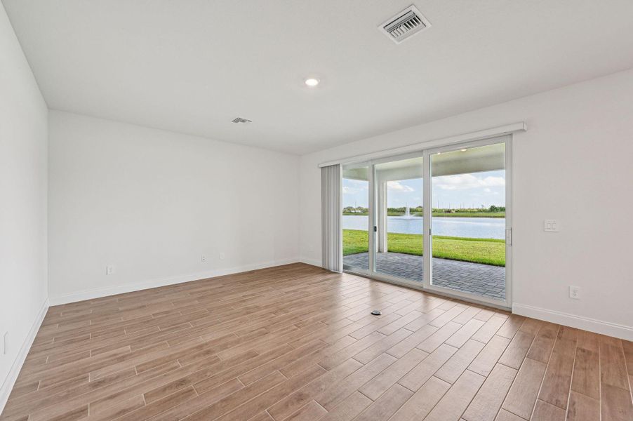 Spacious, unfurnished interior of a new home in Hampton Park - Signature Series, Vero Beach (Image 24). Spacious, unfurnished interior of a new home in Hampton Park - Signature Series, Vero Beach (Image 24).