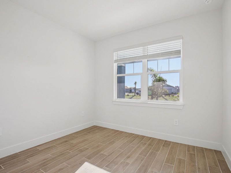 Spacious, unfurnished interior of a new home in Magnolia Bay - Reserve Series, Nokomis (Image 11).