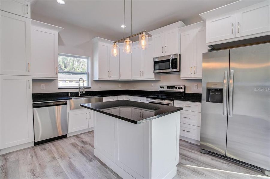 Furnished interior view inside a new home in , Port Richey (Image 26).