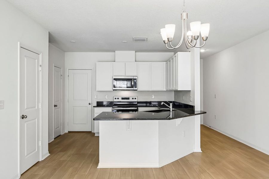 Furnished interior view inside a new home in Reserve at Forest Lake Townhomes, Lake Wales (Image 5).