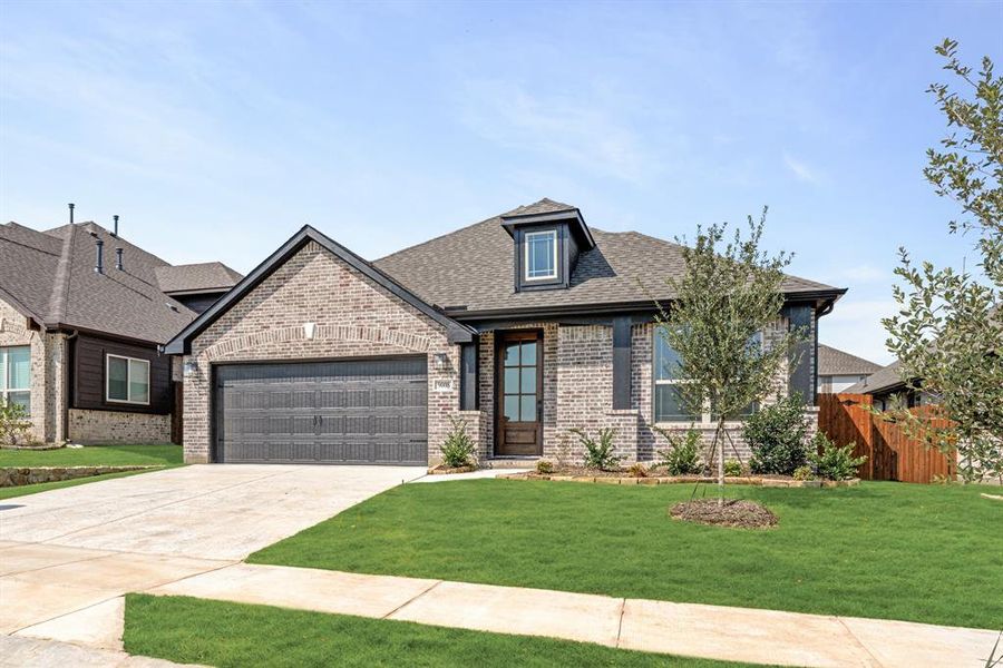 Front exterior of a new home in Country Lakes Classic 50, Denton, TX, highlighting curb appeal (Image 23).