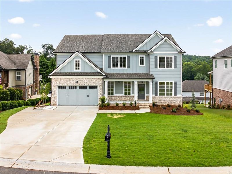Front exterior of a new home in , Jefferson, GA, highlighting curb appeal (Image 24).