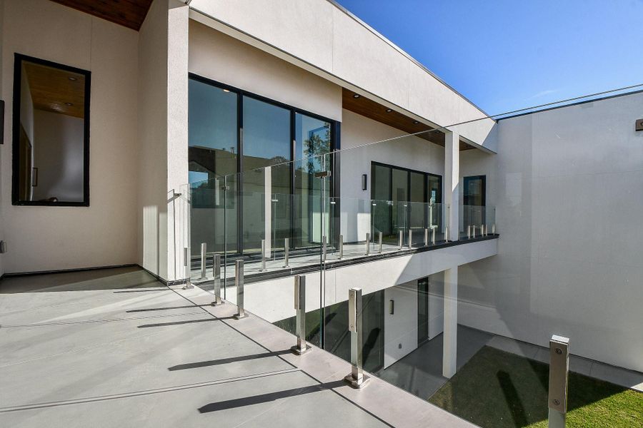 Exterior details and patio area of a home in , Houston (Image 3).