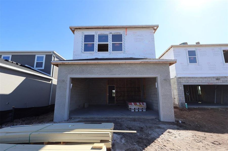 In-progress construction of a new home in Center Lake on the Park, St. Cloud, FL (Image 11).