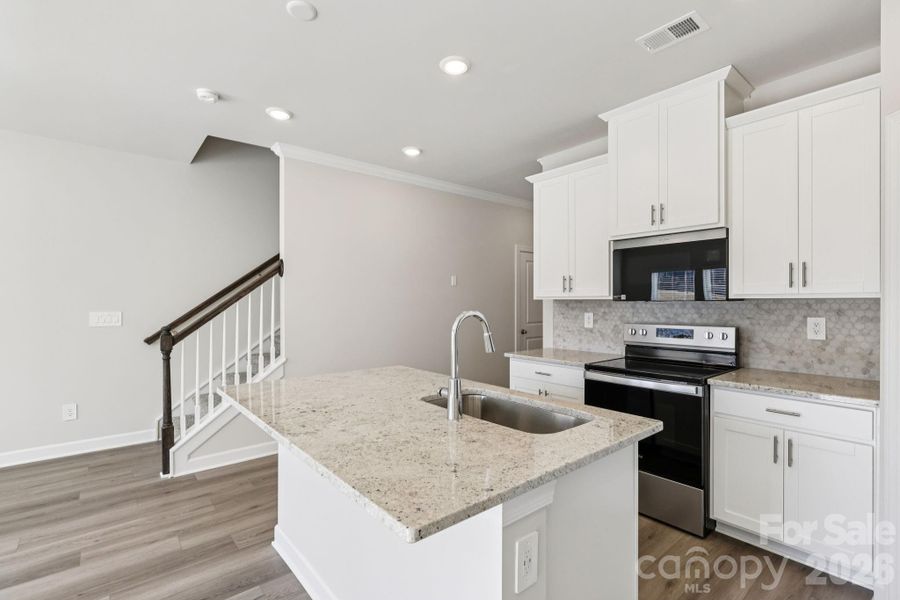Photo is not of the actual home, but is an inspirational photo of builder’s model home and may depict options, furnishings, and/or decorator features that are not included Photo is not of the actual home, but is an inspirational photo of builder’s model home and may depict options, furnishings, and/or decorator features that are not included