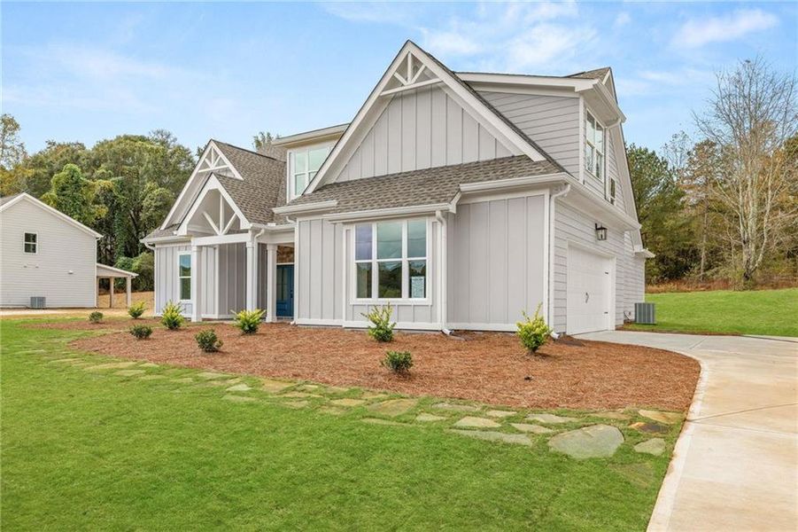 Front exterior of a new home in , Jefferson, GA, highlighting curb appeal (Image 24).