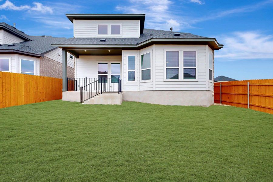 Exterior details and patio area of a home in Heritage, Dripping Springs (Image 3).