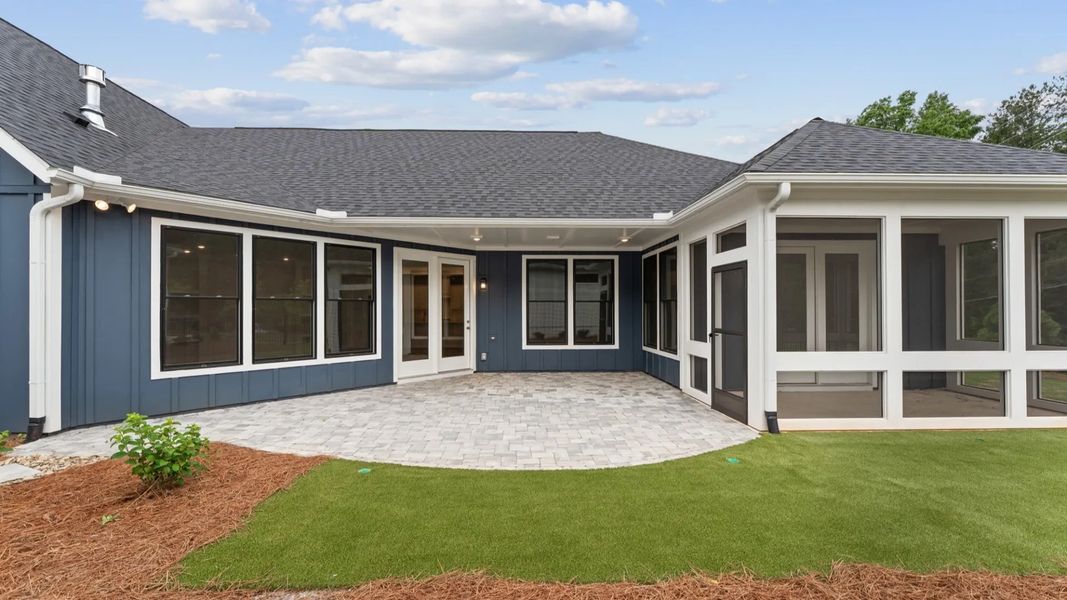 Exterior details and patio area of a home in The Courtyards at Redbud Lane, Canton (Image 20).