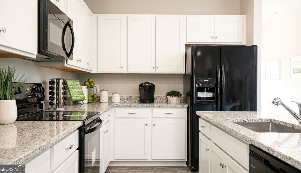 Furnished interior view inside a new home in The Cottages of Silvertown, Thomaston (Image 11).