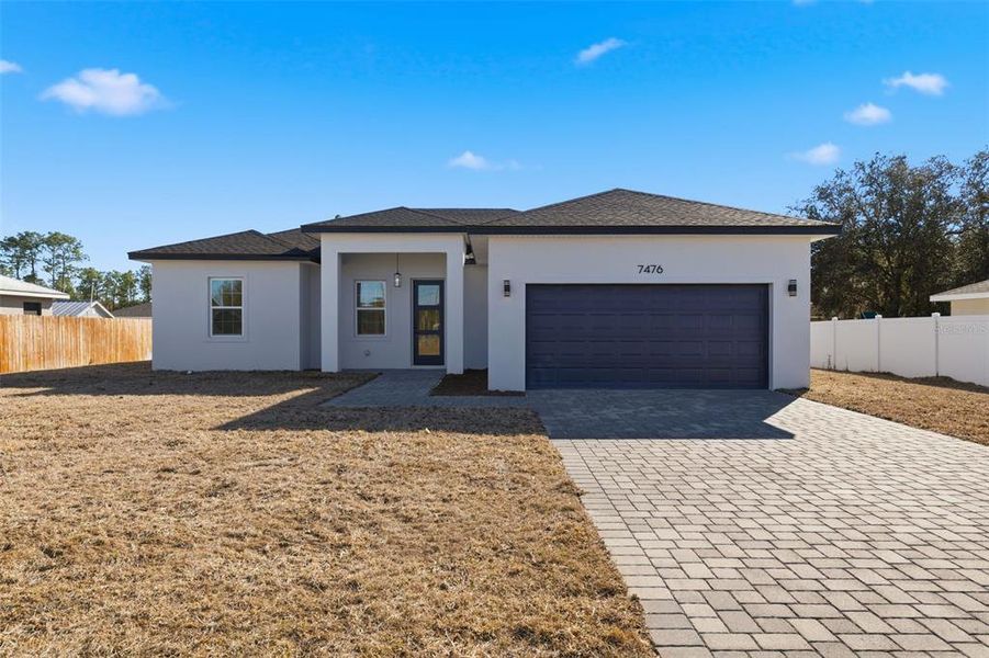 Front exterior of a new home in , Ocala, FL, highlighting curb appeal (Image 20). Front exterior of a new home in , Ocala, FL, highlighting curb appeal (Image 20).