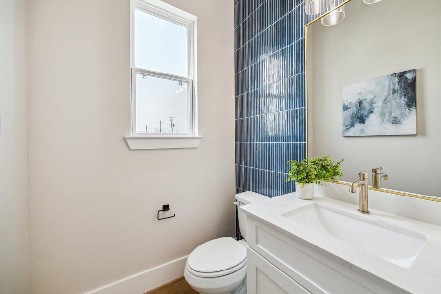 Powder bathroom located on the second level off the living room.