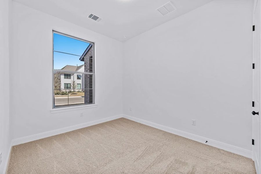 Spacious, unfurnished interior of a new home in Parmer Ranch 60, Georgetown (Image 16).