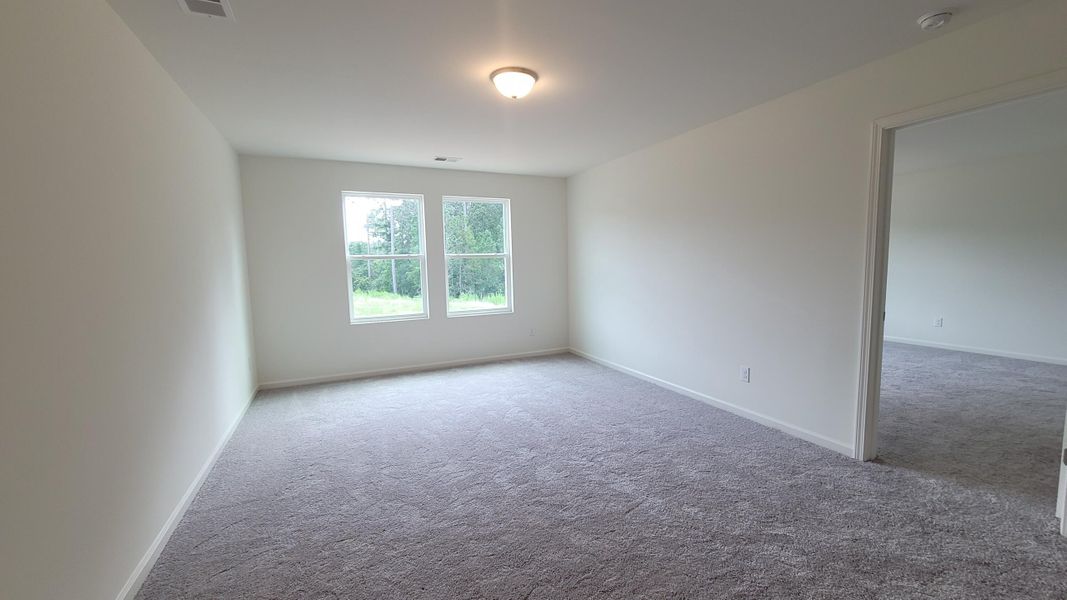 Spacious, unfurnished interior of a new home in Pender Woods at Cane Bay, Summerville (Image 6). Spacious, unfurnished interior of a new home in Pender Woods at Cane Bay, Summerville (Image 6).