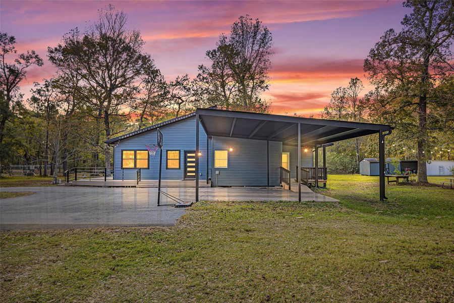 Exterior details and patio area of a home in , Splendora (Image 18). Exterior details and patio area of a home in , Splendora (Image 18).