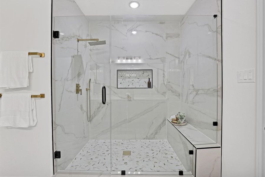 Bathroom with an enclosed shower