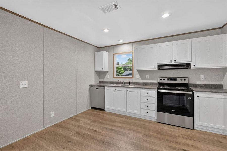 Furnished interior view inside a new home in , Wildwood (Image 7).
