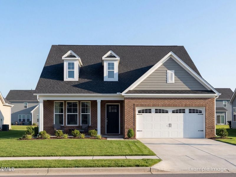 Front exterior of a new home in Sage on North Main, Wake Forest, NC, highlighting curb appeal (Image 1). Front exterior of a new home in Sage on North Main, Wake Forest, NC, highlighting curb appeal (Image 1).