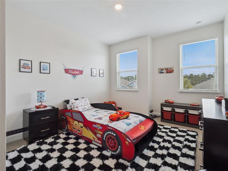 Furnished interior view inside a new home in Harvest at Ovation, Winter Garden (Image 29).